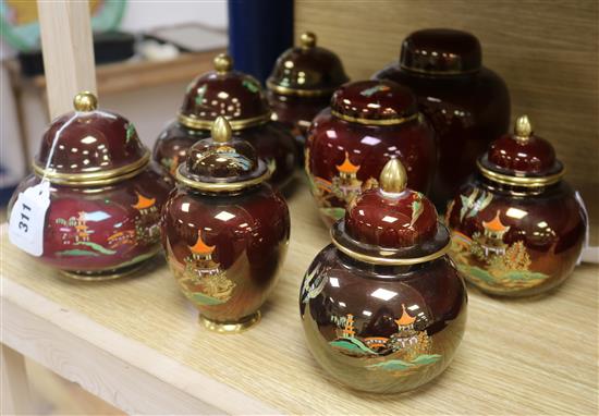 A pair of Carlton Ware Rouge Royale Pagoda ginger jars and covers, five similar small jars and covers and a plain example (8)